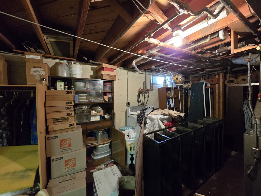 Second basement view showing the full extent of the stored contents