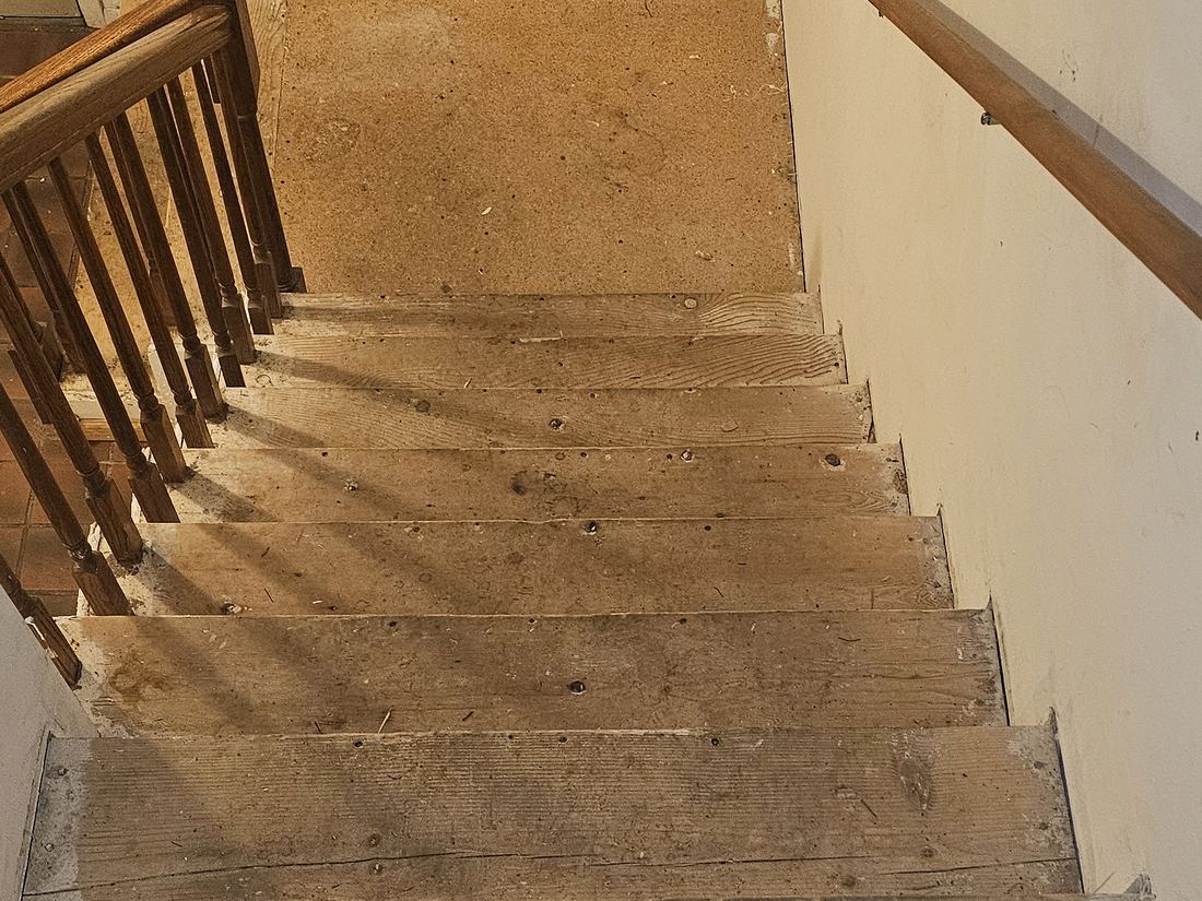 Staircase stripped back to the treads